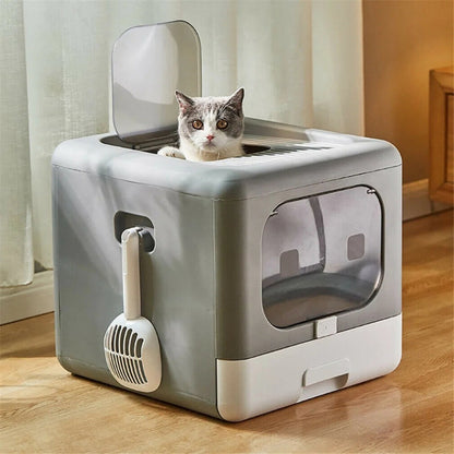 Caja de arena plegable y compacta para gato