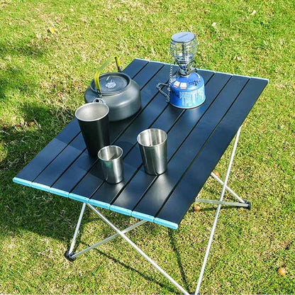 Mesa de camping compacta y resistente